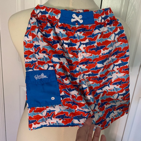 Shark print red and blue UV Skins boys swim trunks. - Picture 4 of 4